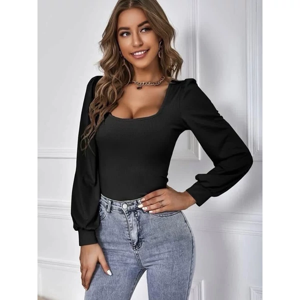 Enyhén puffos vállú fekete felső