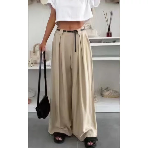 Lenge anyagú bő szabású bézs nadrág 
